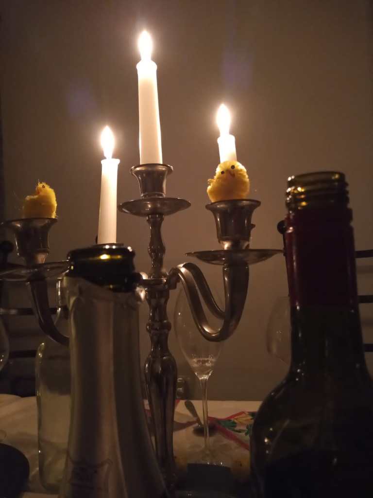 Easter chicks amongst the candles